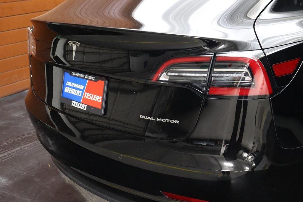 used 2023 Tesla Model 3 car, priced at $26,990
