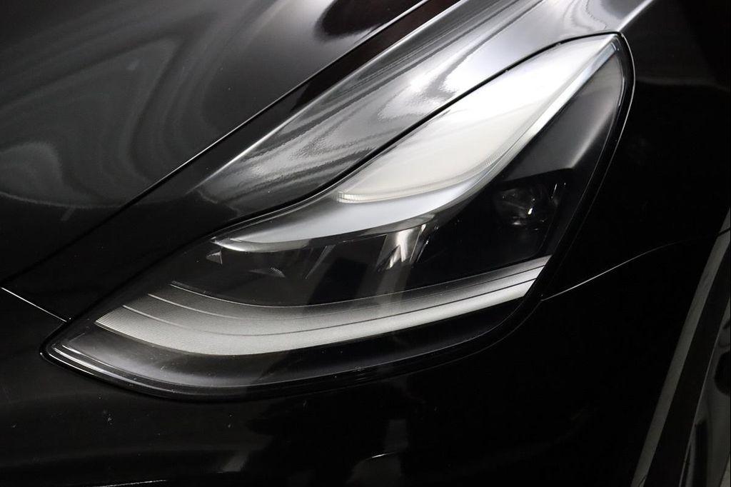 used 2023 Tesla Model 3 car, priced at $26,990