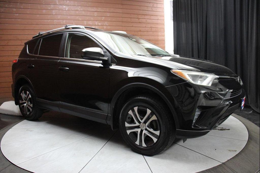 used 2018 Toyota RAV4 car, priced at $17,990
