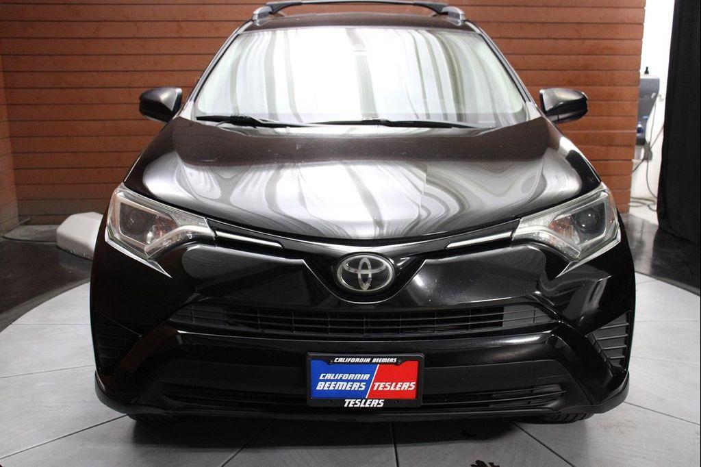 used 2018 Toyota RAV4 car, priced at $17,990