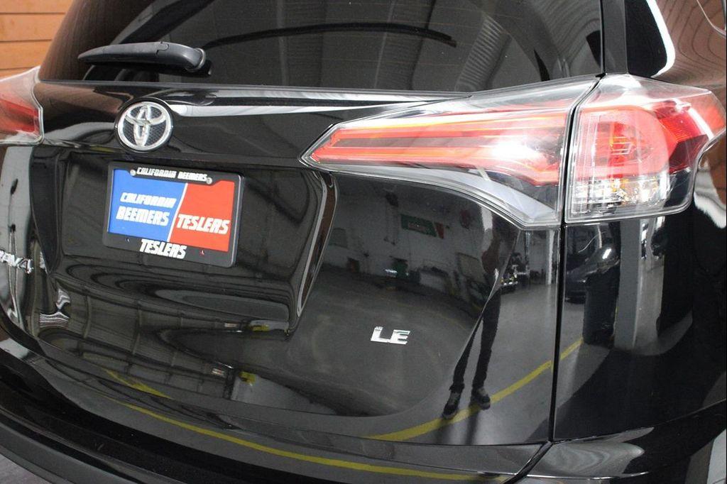 used 2018 Toyota RAV4 car, priced at $17,990