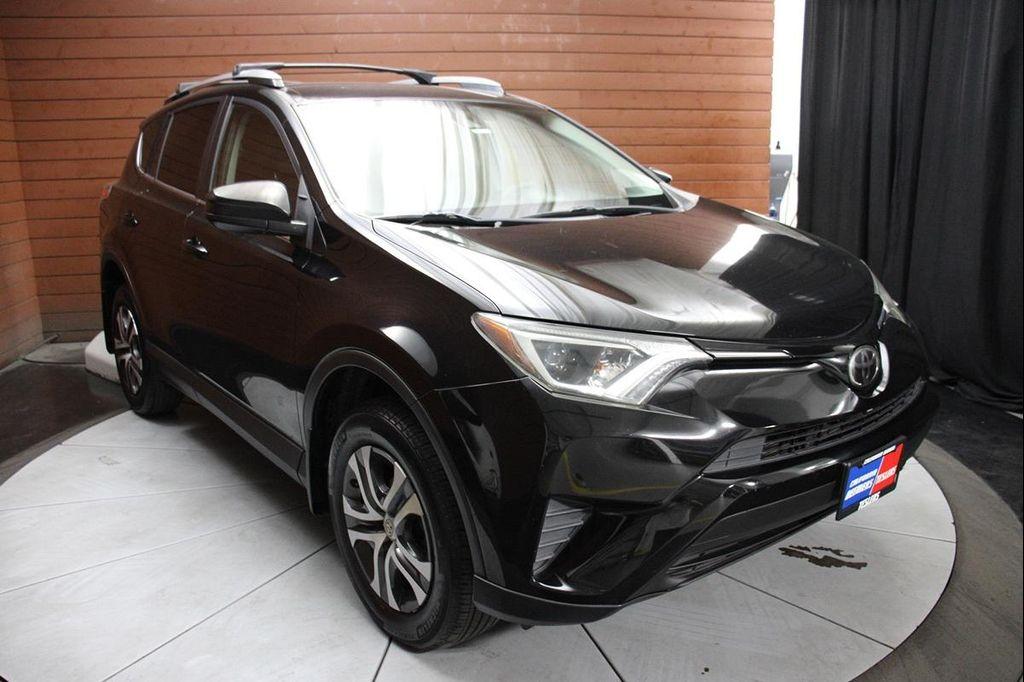 used 2018 Toyota RAV4 car, priced at $17,990