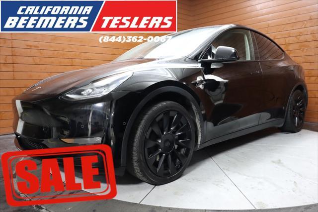 used 2021 Tesla Model Y car, priced at $28,999