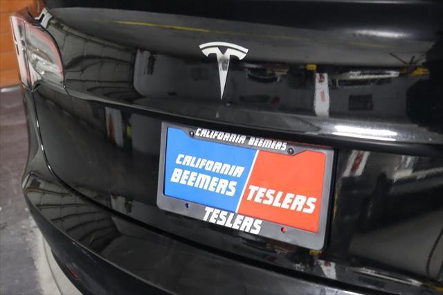 used 2021 Tesla Model 3 car, priced at $20,590