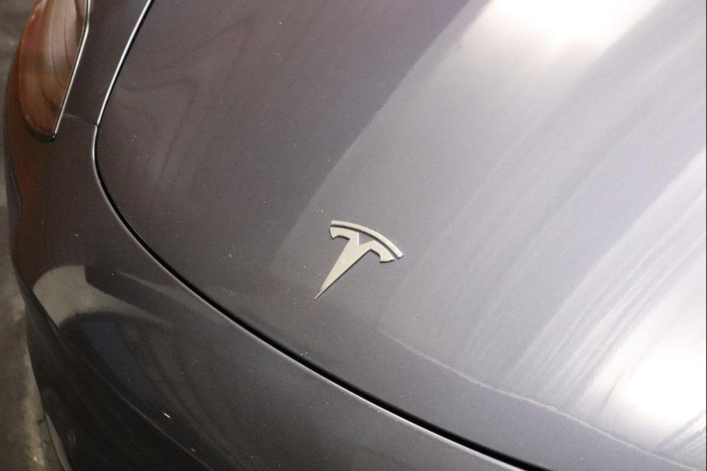 used 2023 Tesla Model 3 car, priced at $21,990
