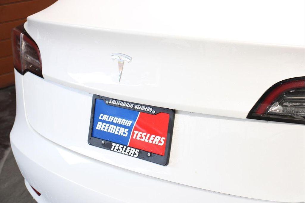 used 2023 Tesla Model 3 car, priced at $21,490
