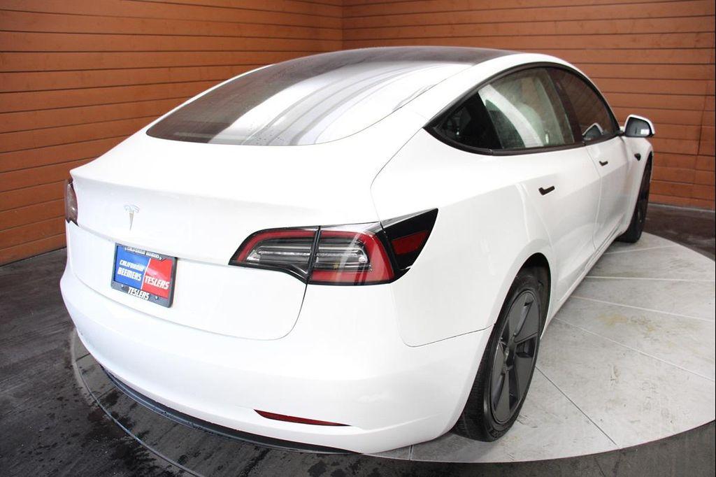 used 2023 Tesla Model 3 car, priced at $21,490