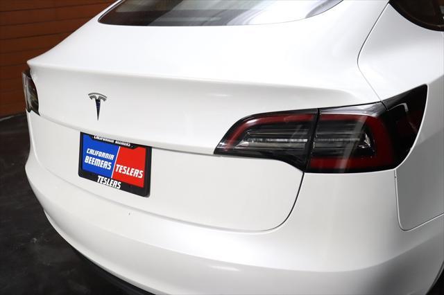 used 2023 Tesla Model 3 car, priced at $25,990