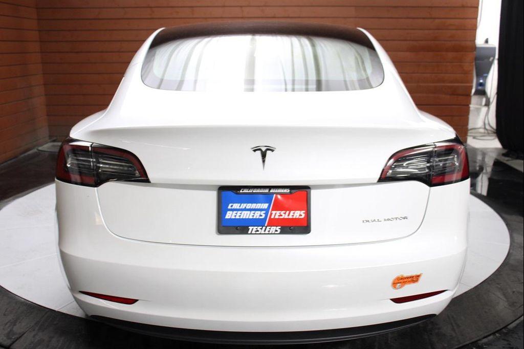 used 2023 Tesla Model 3 car, priced at $25,590