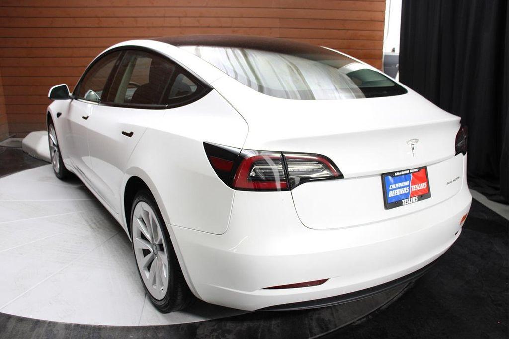 used 2023 Tesla Model 3 car, priced at $25,590