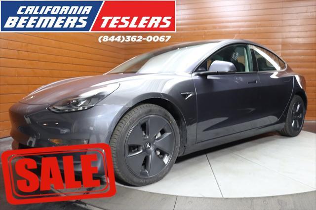 used 2022 Tesla Model 3 car, priced at $25,990