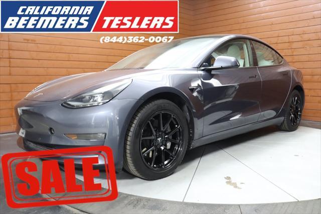 used 2022 Tesla Model 3 car, priced at $26,990