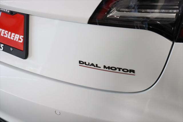 used 2022 Tesla Model 3 car, priced at $28,490