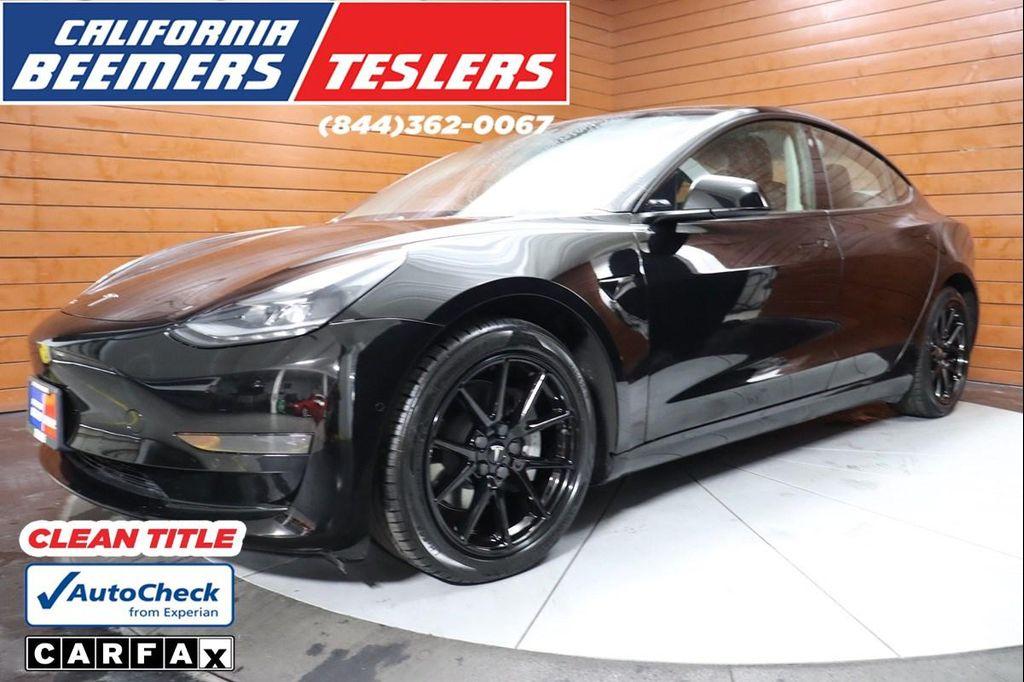 used 2023 Tesla Model 3 car, priced at $25,990