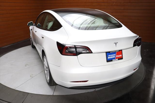 used 2023 Tesla Model 3 car, priced at $26,490