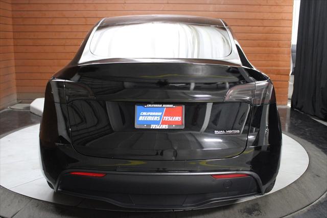used 2022 Tesla Model Y car, priced at $27,999