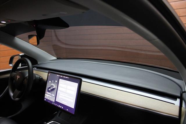used 2022 Tesla Model Y car, priced at $27,999