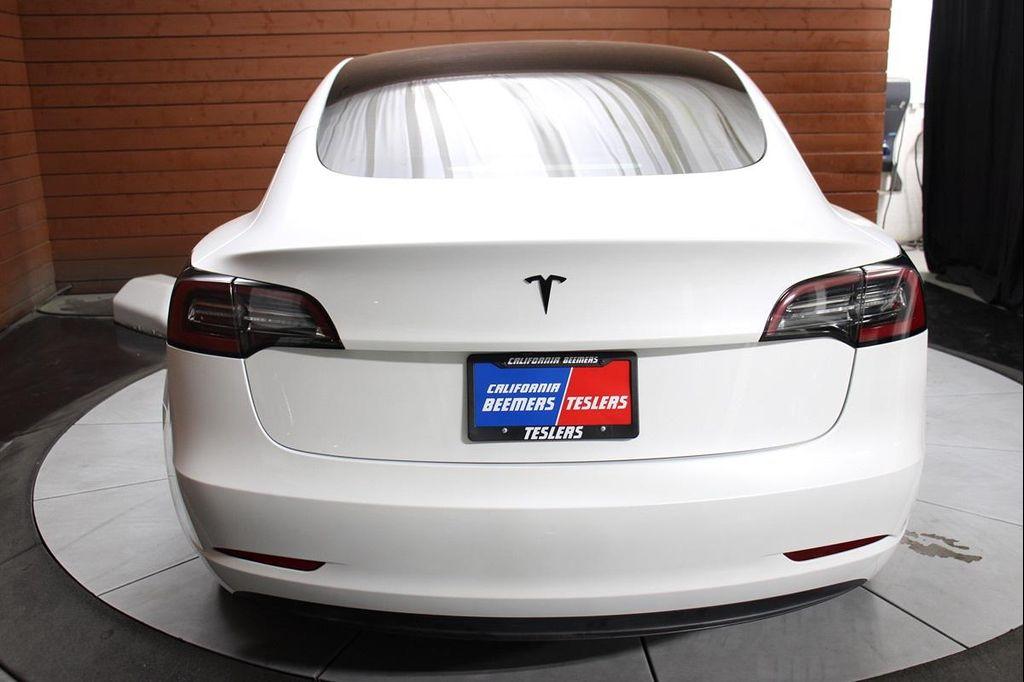 used 2023 Tesla Model 3 car, priced at $25,990