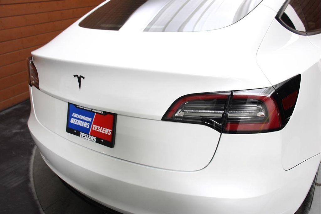 used 2023 Tesla Model 3 car, priced at $25,990