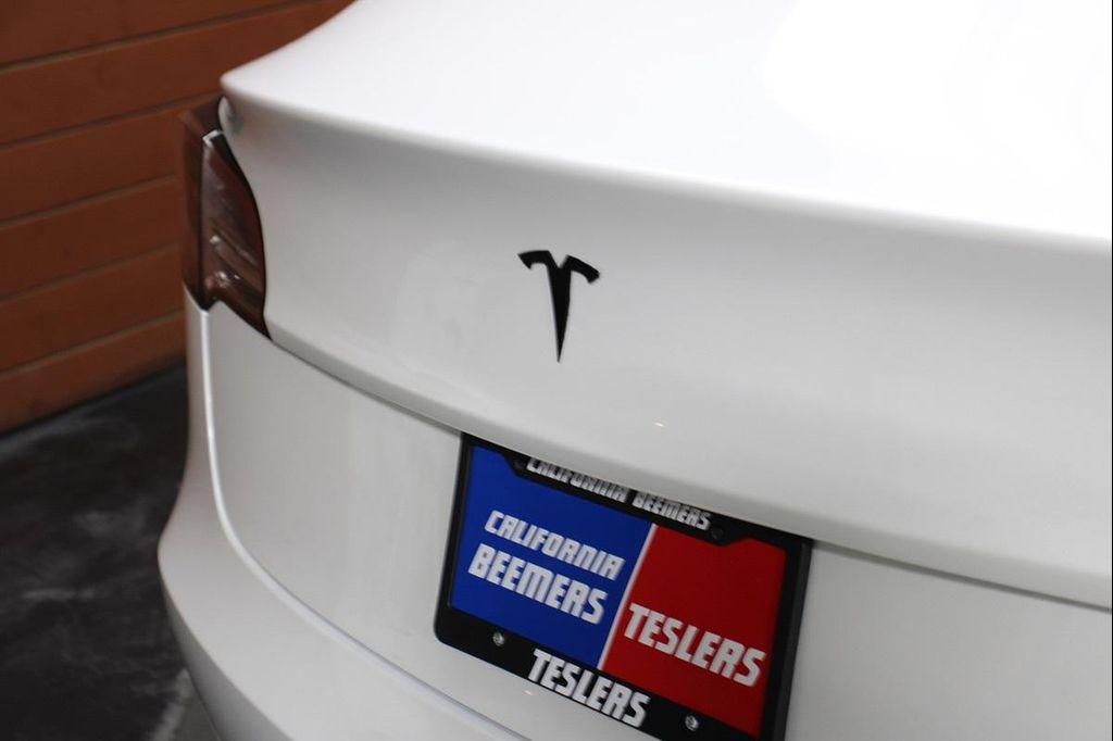 used 2023 Tesla Model 3 car, priced at $25,990
