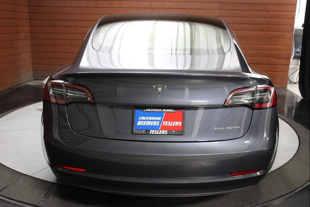 used 2023 Tesla Model 3 car, priced at $26,990