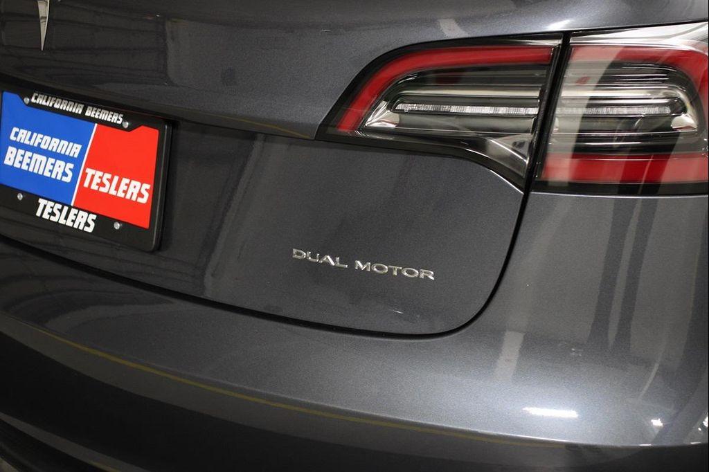used 2023 Tesla Model 3 car, priced at $26,990