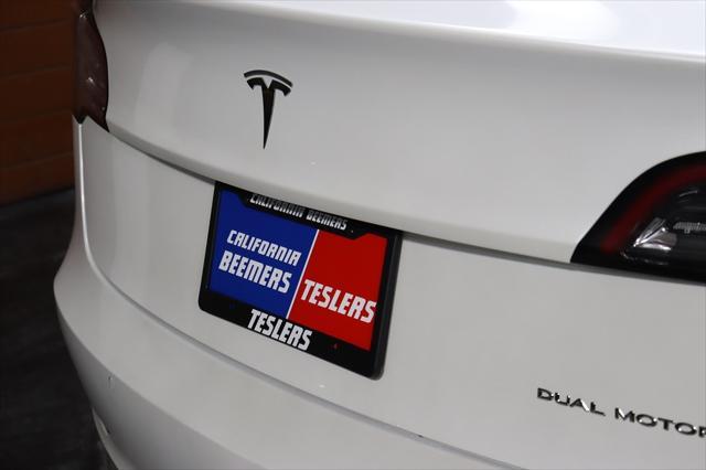 used 2021 Tesla Model 3 car, priced at $24,999