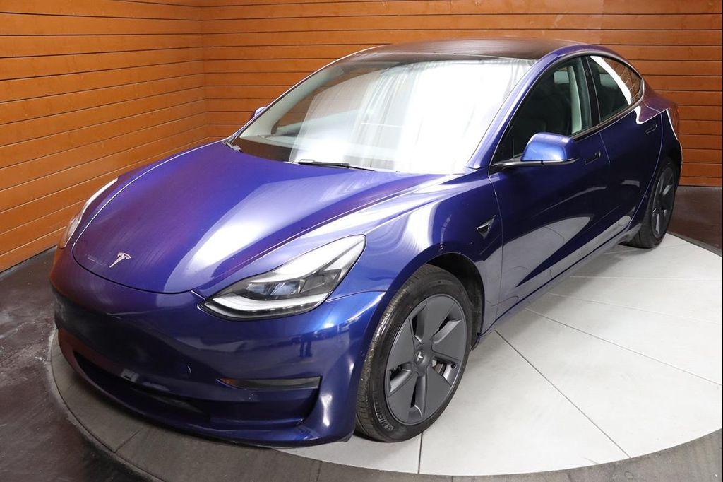 used 2023 Tesla Model 3 car, priced at $20,790