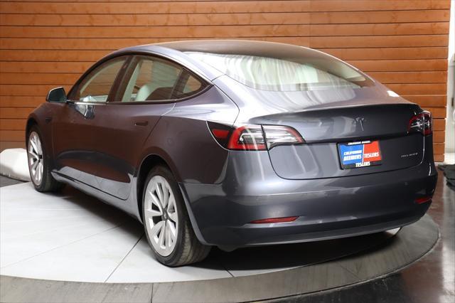 used 2022 Tesla Model 3 car, priced at $27,590