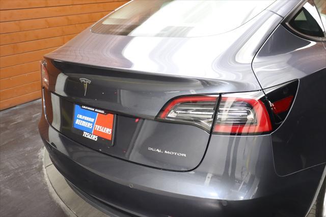 used 2022 Tesla Model 3 car, priced at $27,590