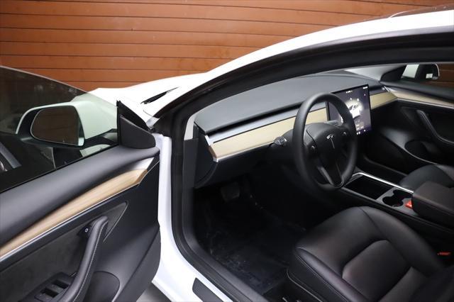 used 2023 Tesla Model 3 car, priced at $20,999
