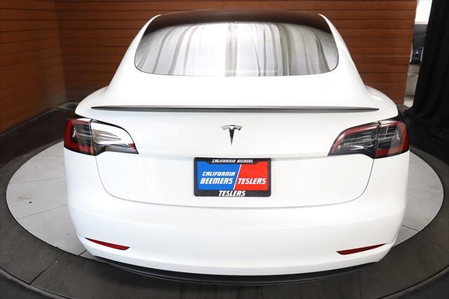 used 2023 Tesla Model 3 car, priced at $20,999