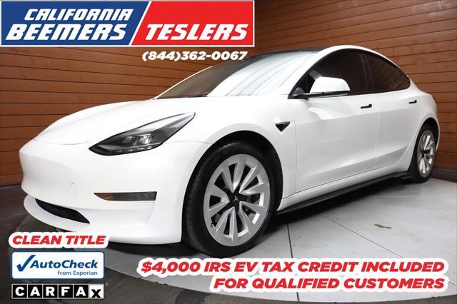 used 2023 Tesla Model 3 car, priced at $20,990