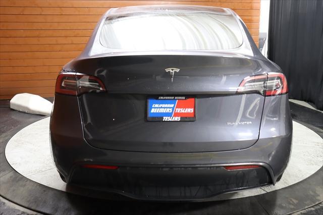 used 2021 Tesla Model Y car, priced at $28,290