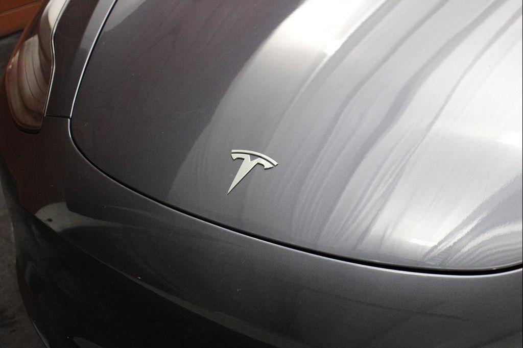 used 2023 Tesla Model 3 car, priced at $20,999