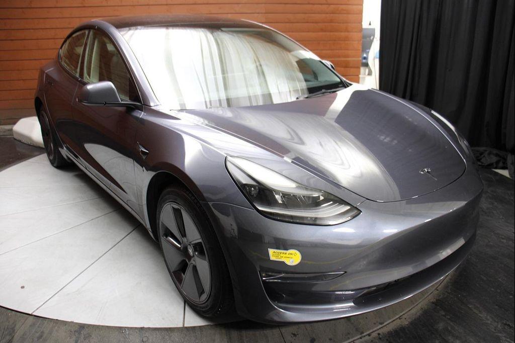used 2023 Tesla Model 3 car, priced at $20,999