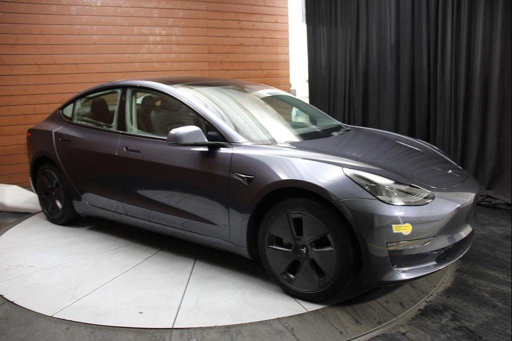 used 2023 Tesla Model 3 car, priced at $20,999