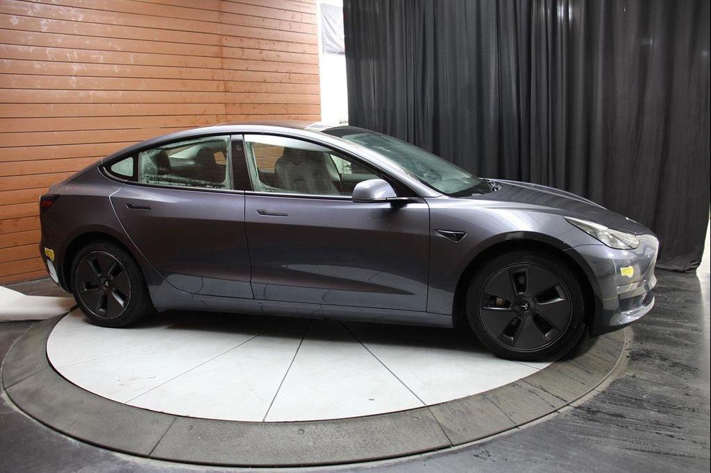 used 2023 Tesla Model 3 car, priced at $20,999
