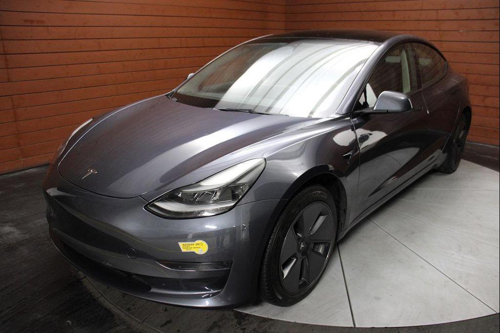 used 2023 Tesla Model 3 car, priced at $20,999