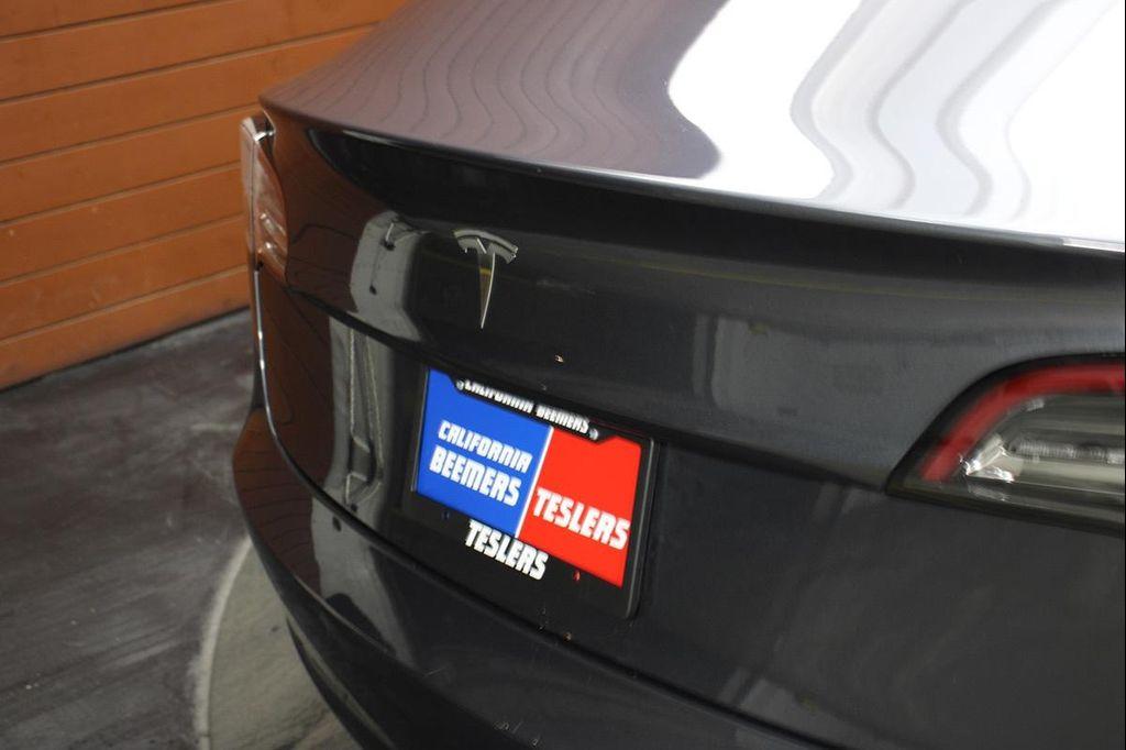 used 2023 Tesla Model 3 car, priced at $20,999