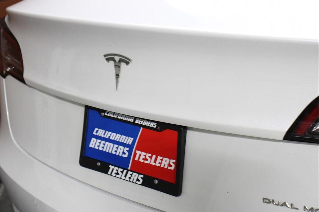 used 2022 Tesla Model 3 car, priced at $25,490