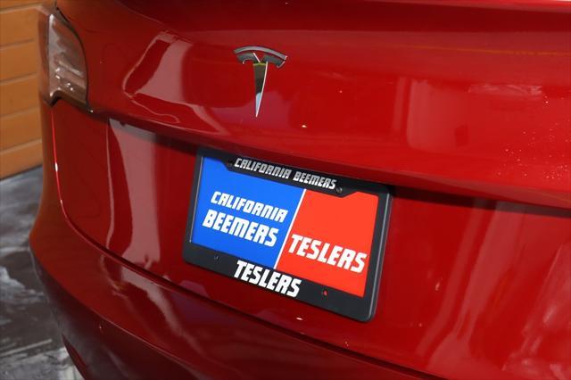 used 2022 Tesla Model 3 car, priced at $20,990