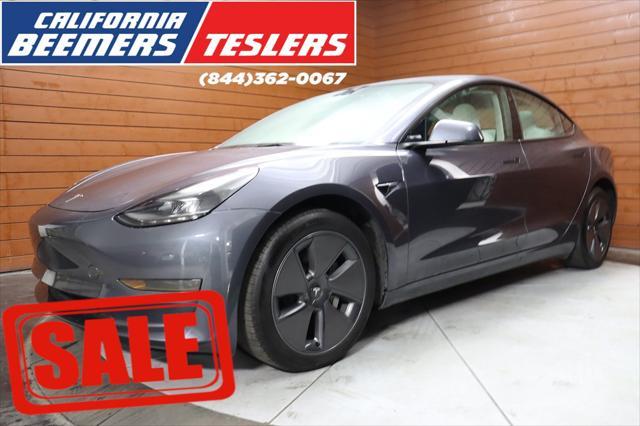 used 2023 Tesla Model 3 car, priced at $26,490