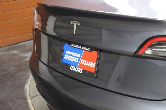 used 2023 Tesla Model 3 car, priced at $26,490