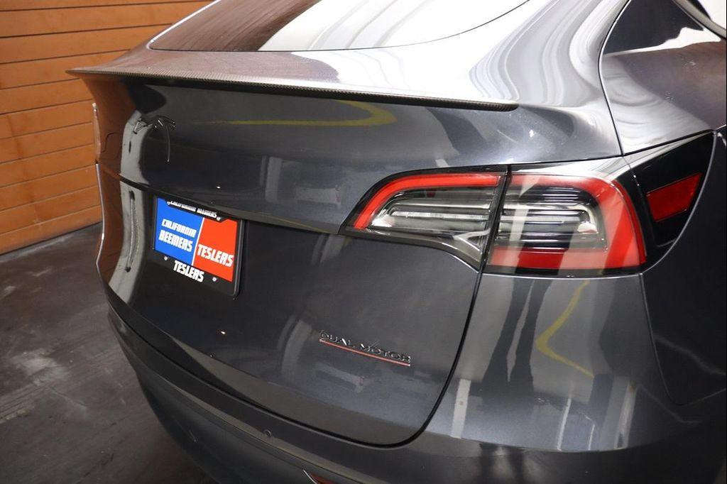 used 2021 Tesla Model Y car, priced at $27,990