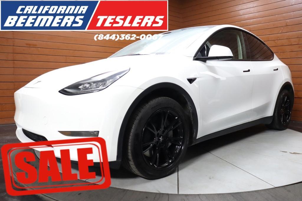 used 2021 Tesla Model Y car, priced at $30,290