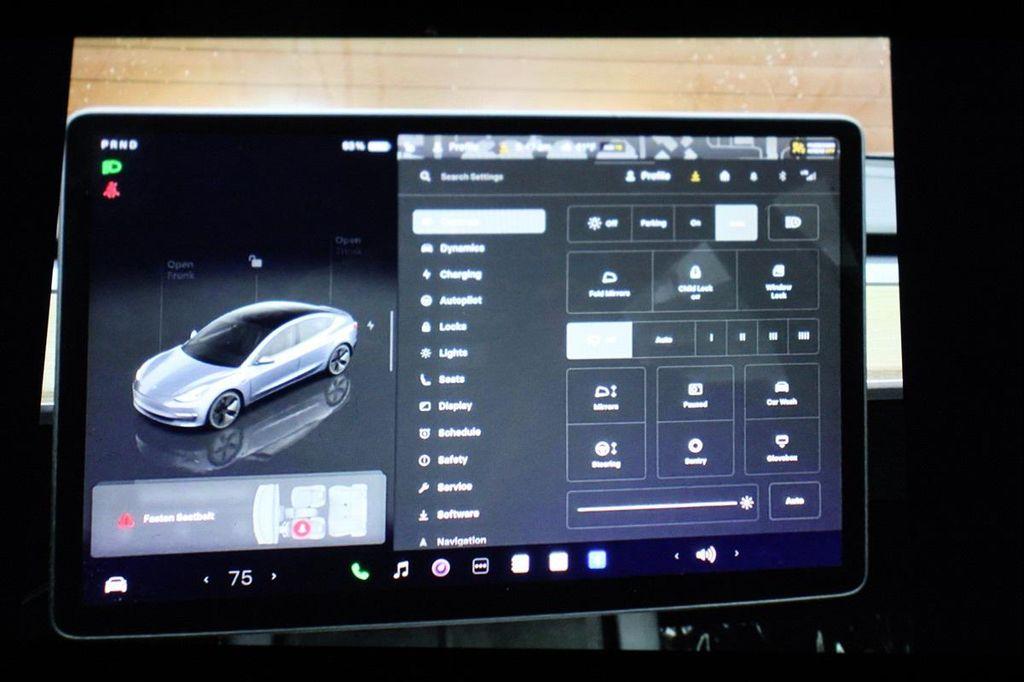 used 2023 Tesla Model 3 car, priced at $21,490