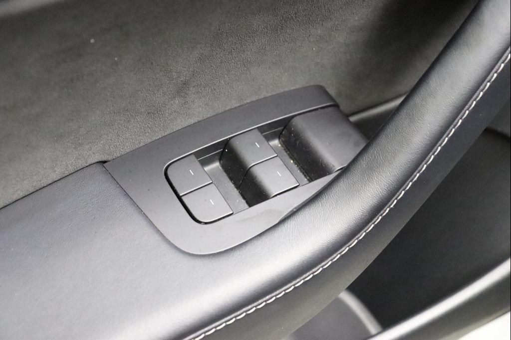 used 2023 Tesla Model 3 car, priced at $21,490