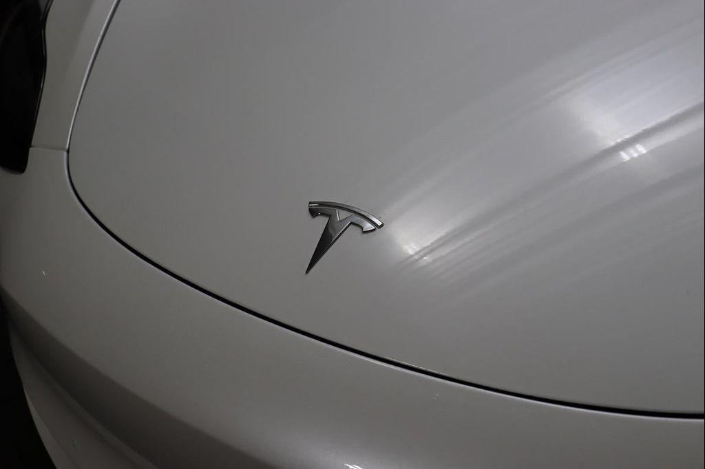 used 2023 Tesla Model 3 car, priced at $20,990