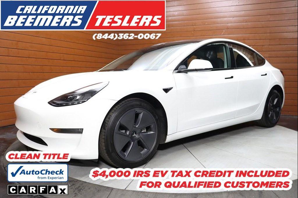 used 2023 Tesla Model 3 car, priced at $20,990